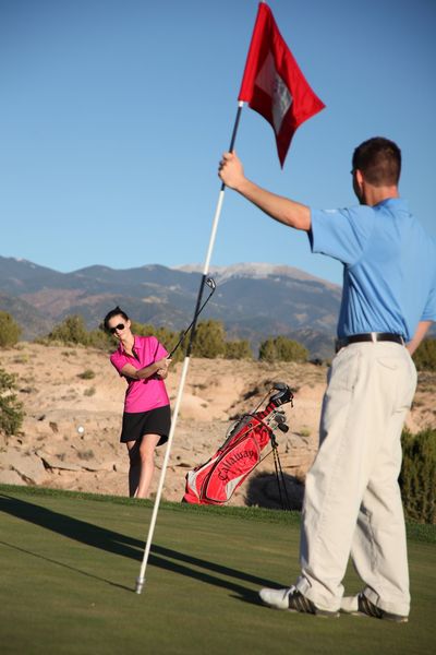 Man and woman on golf course